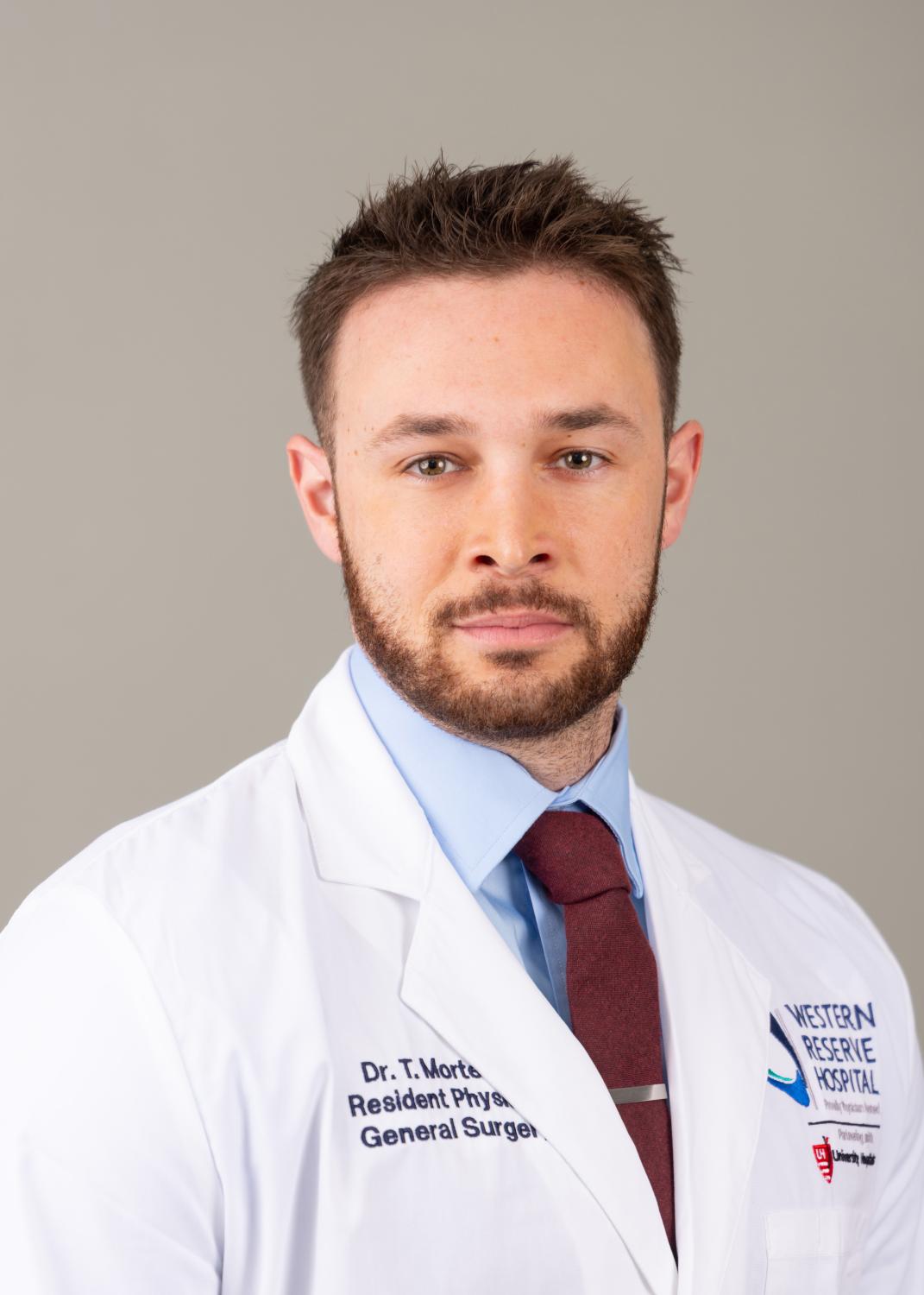 Dr. Tyler Mortellaro Headshot