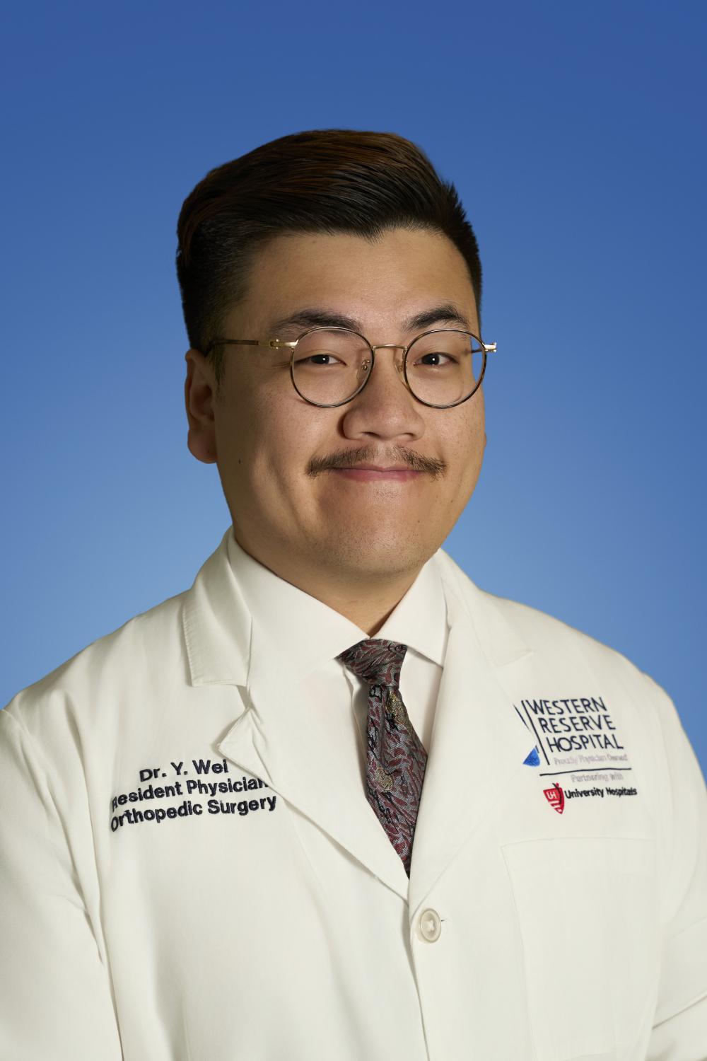Yi Wei