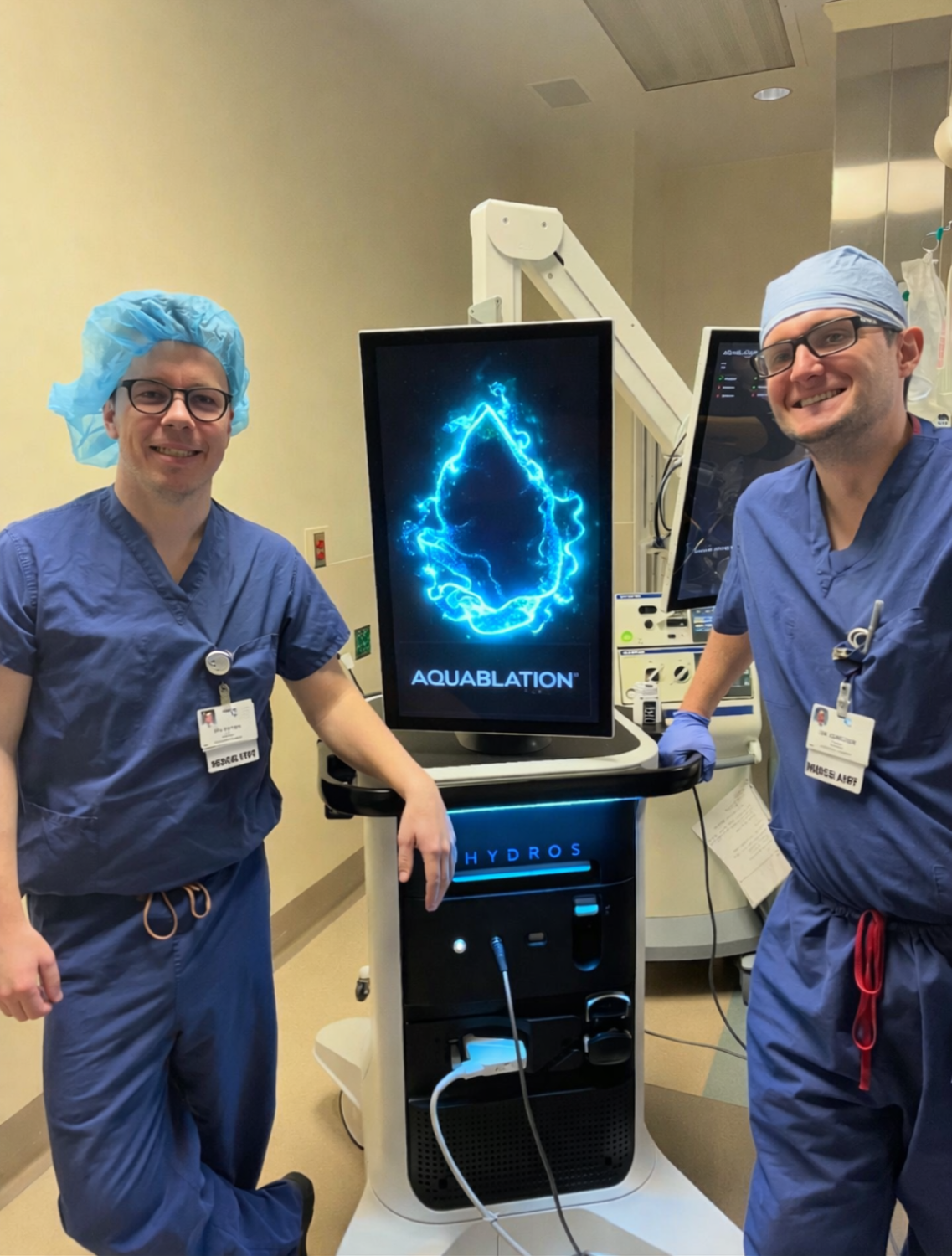 Pictured, L to R: Zane Giffen, MD and Damian Garcher, MD stand with the new HYDROS™ Robotic System used for Aquablation Therapy