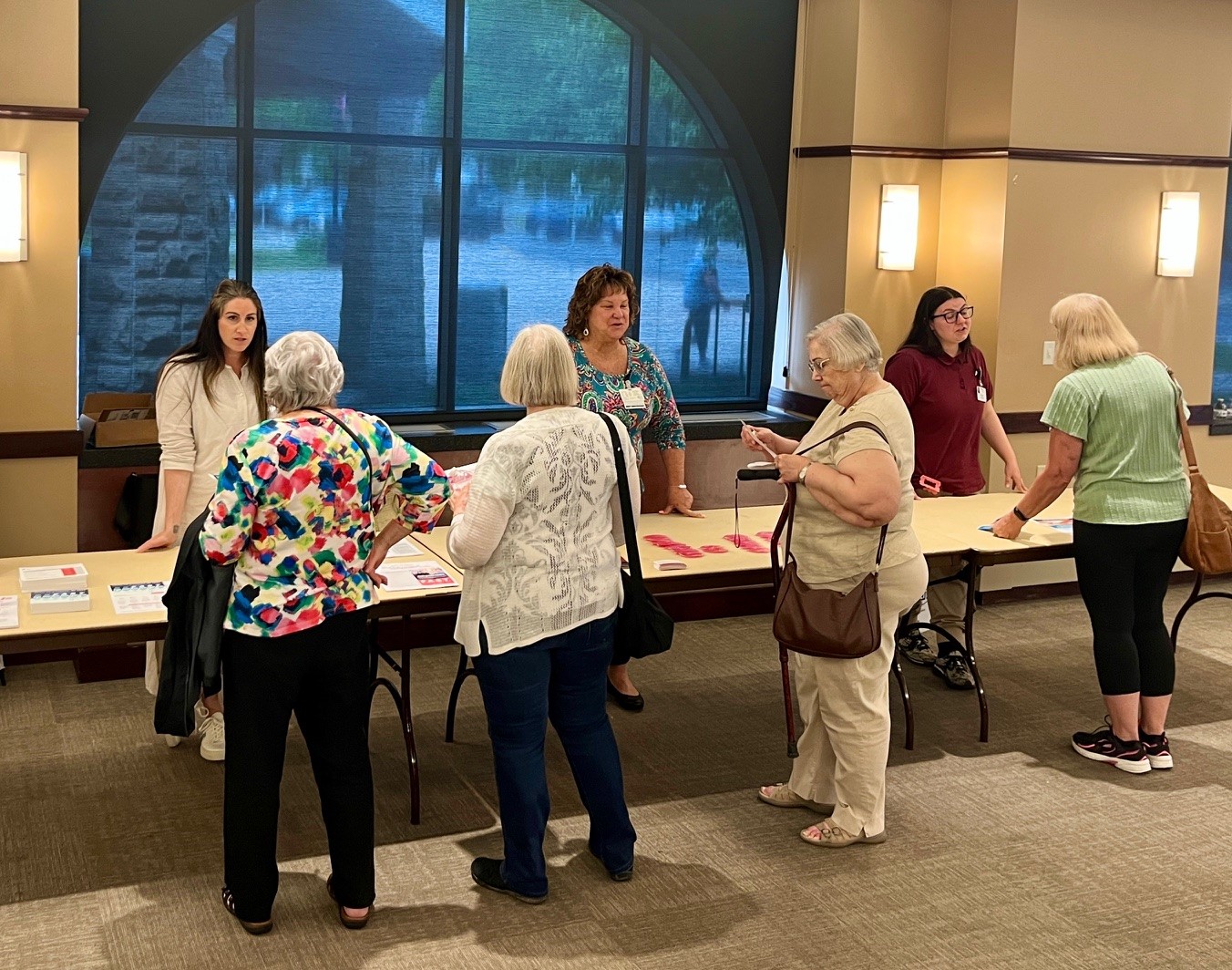 Staff members host tables on stroke, urogynecology and physical therapy options. 
