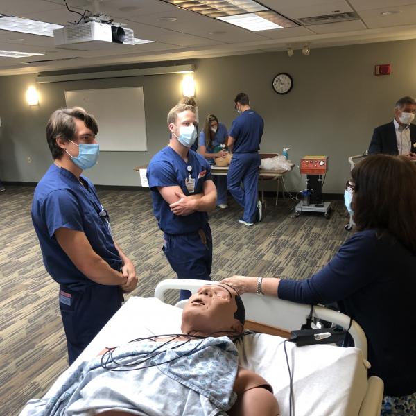 Foreground L to R: Jordan Read, Derek Renner, Susan Straus (instructor),Tony Donofrio (Stryker rep)