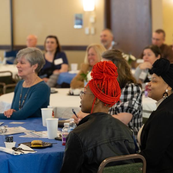 Audience listens to Katlin Hall